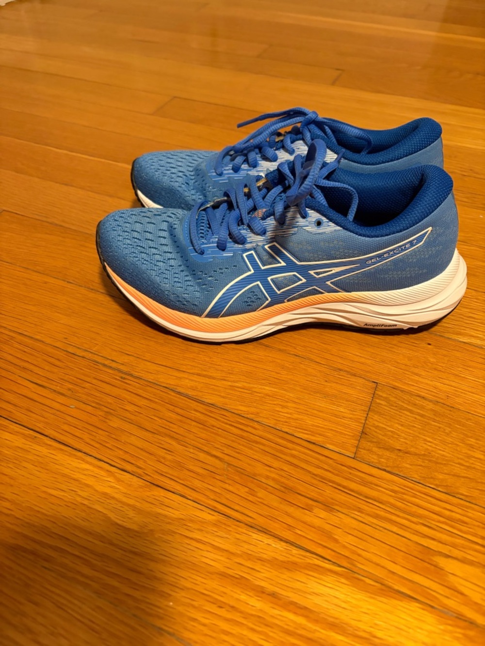 Asics Blue Running Shoes with White and Coral Accents